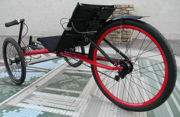  - The rear wheel of this Rambler sports a Shimano Alfine 8-speed IGH laced to a custom Velocity Aeroheat wheel. We powder coated both the frame and rim with Tiger's Bengal Red color.