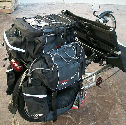 Cargo - This Commuter has the stock cargo system, which includes: a WizWheelz Aluminum Rack, the Axiom Cartier Pannier set, and an Axiom Magellan Trunk bag. The trike owner also wanted a tail-light to be more visible to traffic.